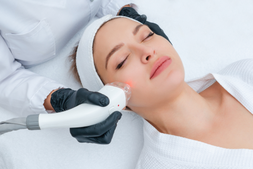 A Young pretty lady getting Laser treatment | Get Medspa Services at Halina Spa in Round Rock & Austin, TX