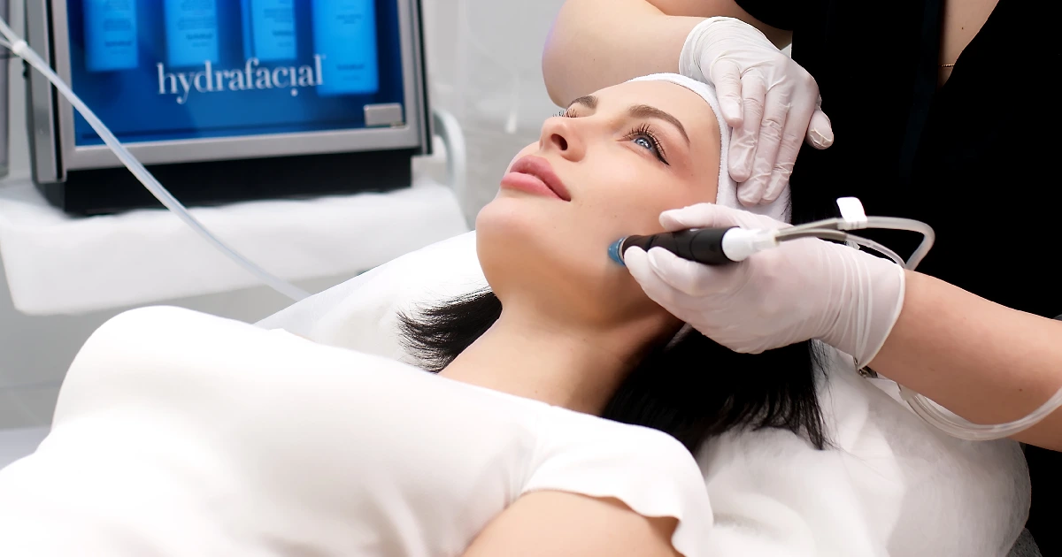 A woman receiving a HydraFacial treatment in Austin, TX